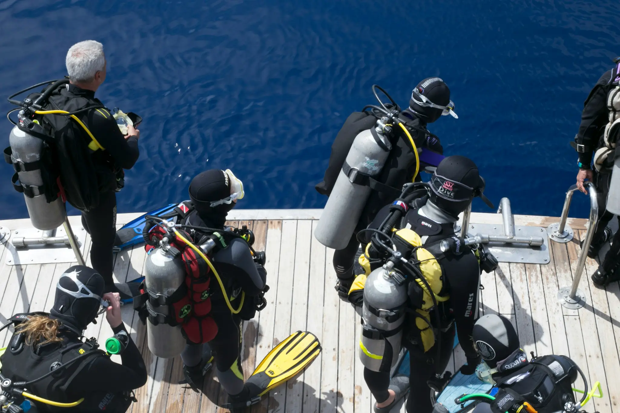 Divers preparing equipment